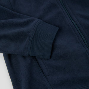 Navy Waterproof Kids Fleece Jacket from the Polarn O. Pyret outerwear collection. Ethically produced kids outerwear.