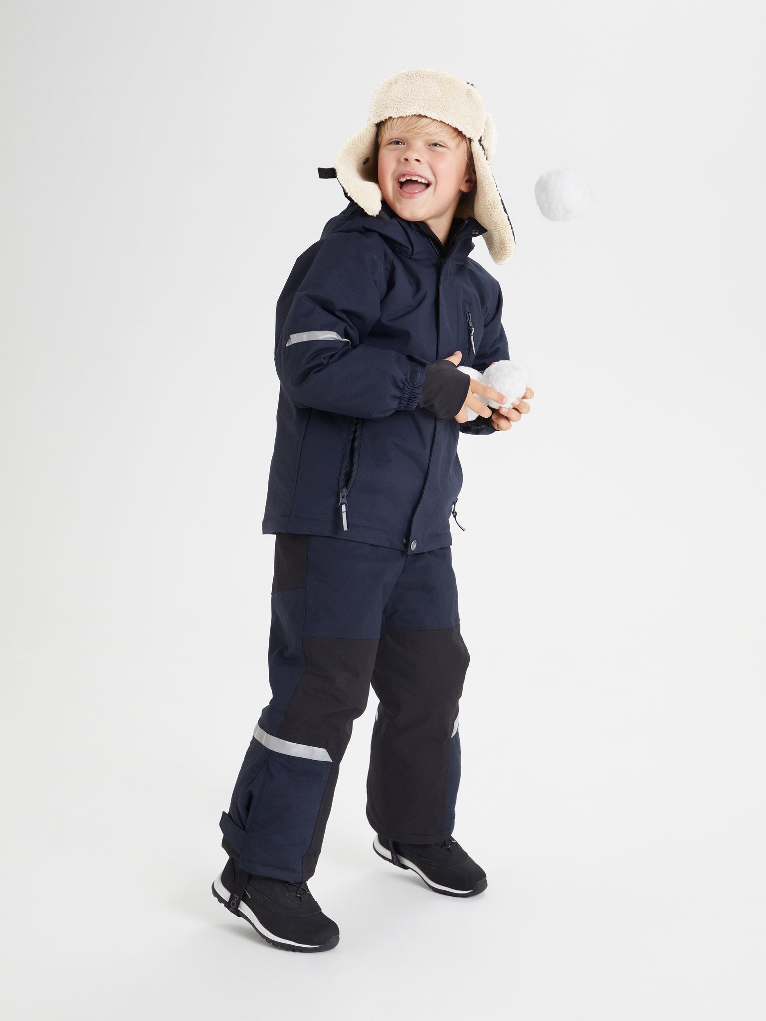 Kids Navy Padded Waterproof Trousers from the Polarn O. Pyret outerwear collection. Ethically produced kids outerwear.