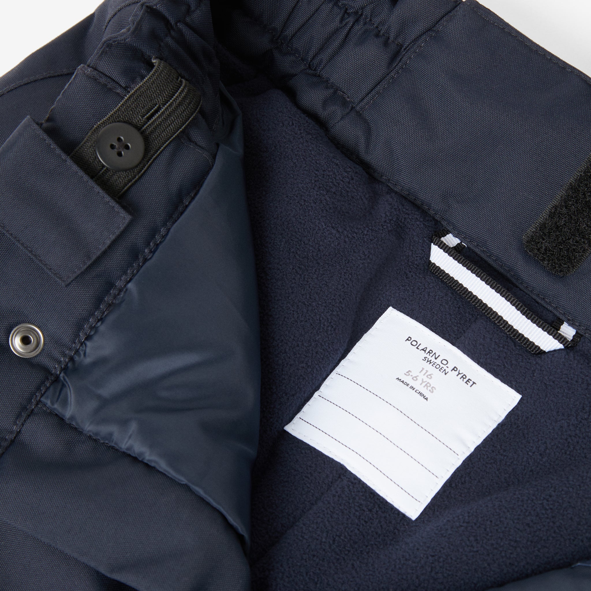 Kids Navy Padded Waterproof Trousers from the Polarn O. Pyret outerwear collection. Ethically produced kids outerwear.