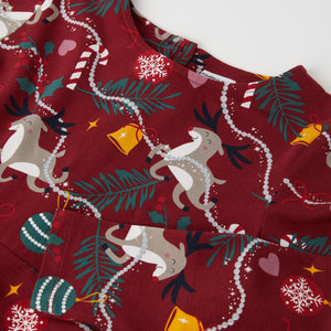 Organic Cotton Kids Christmas Dress from the Polarn O. Pyret kidswear collection. Nordic kids clothes made from sustainable sources.