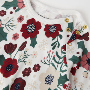 Xmas Floral Organic Cotton Babygrow from the Polarn O. Pyret baby collection. Nordic baby clothes made from sustainable sources.