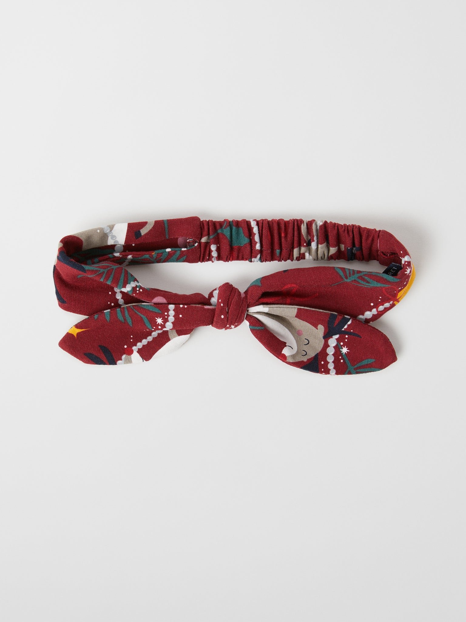 Christmas Print Kids Hair Band from the Polarn O. Pyret kidswear collection. Nordic kids clothes made from sustainable sources.