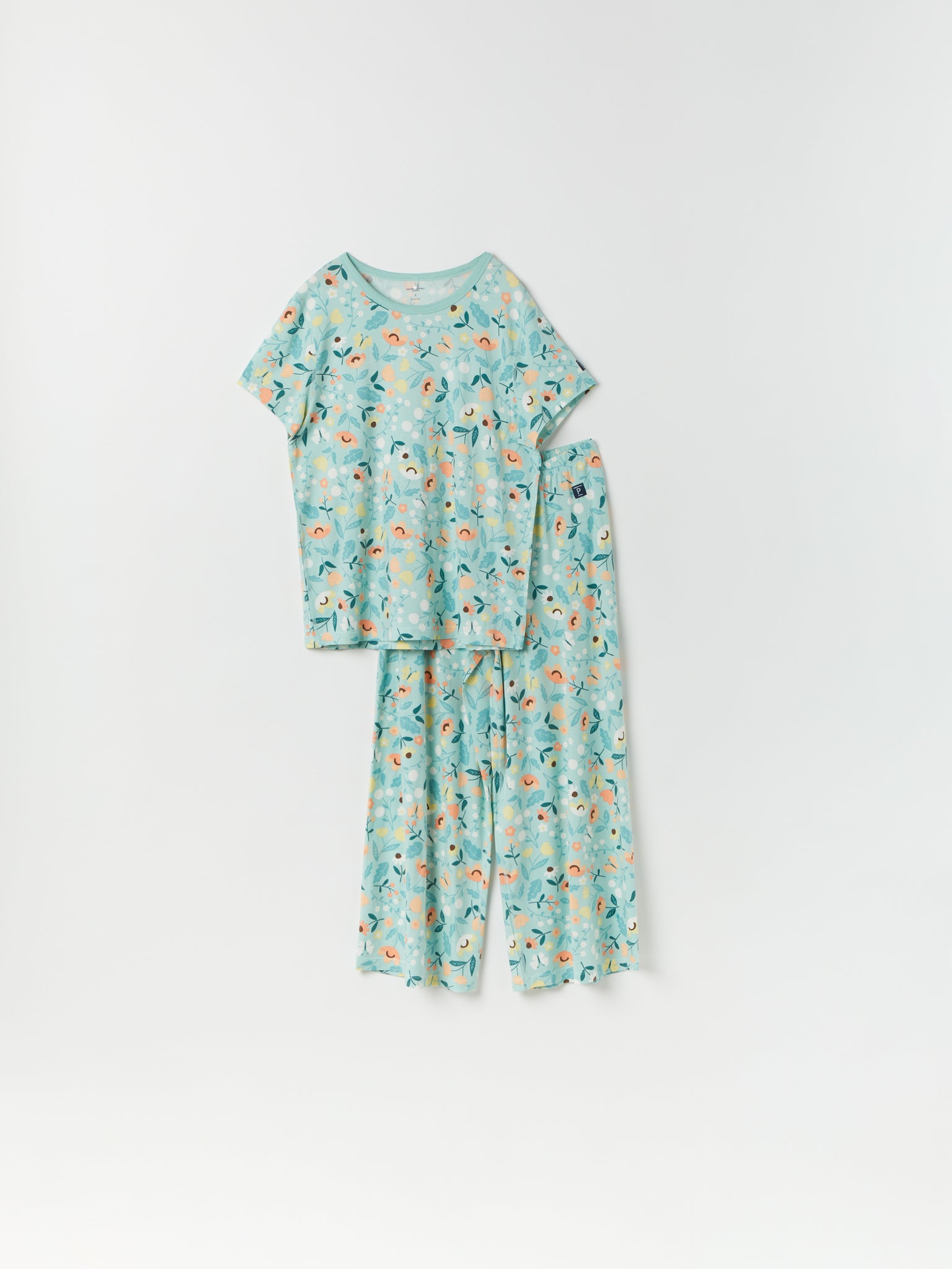 Organic Flora Print Adult Pyjamas from the Polarn O. Pyret kidswear collection. Nordic kids clothes made from sustainable sources.