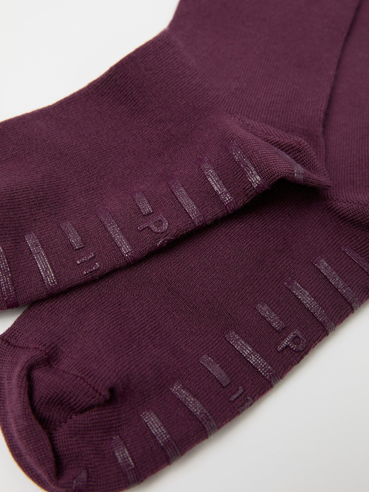 Burgundy Antislip Merino Kids Tights from Polarn O. Pyret kidswear. Clothes made using sustainably sourced materials.