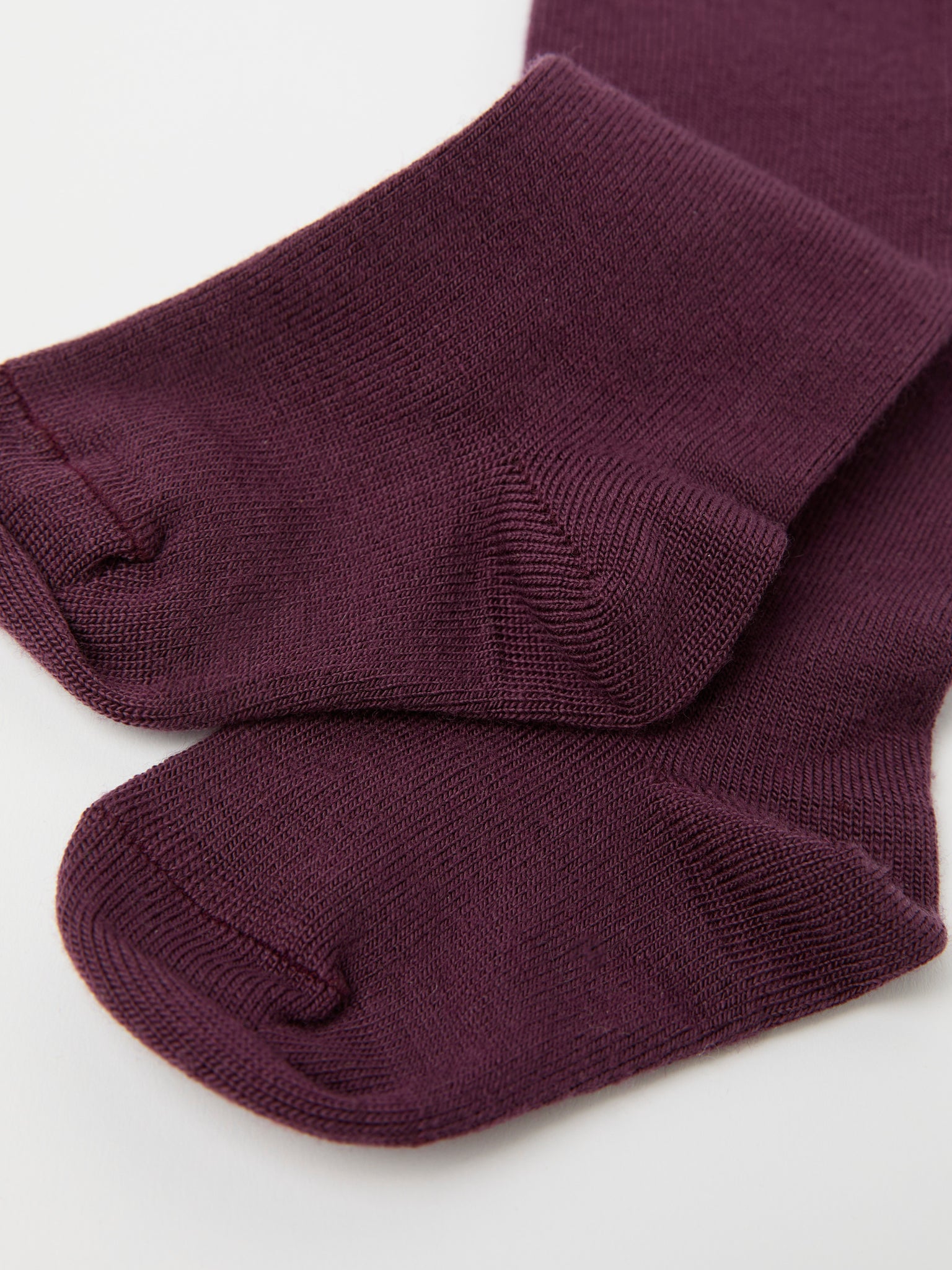 Burgundy Antislip Merino Kids Tights from Polarn O. Pyret kidswear. Clothes made using sustainably sourced materials.