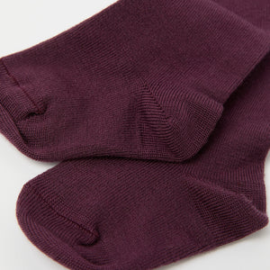 Burgundy Antislip Merino Kids Tights from Polarn O. Pyret kidswear. Clothes made using sustainably sourced materials.