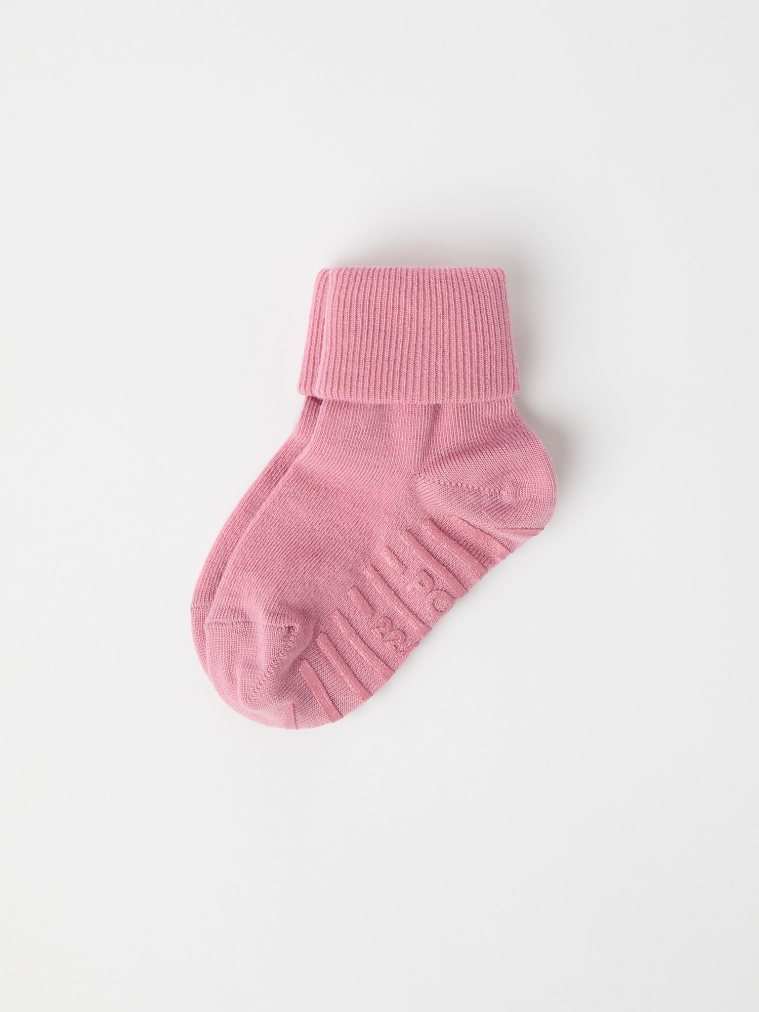 Pink Merino Antislip Kids Socks from Polarn O. Pyret kidswear. Nordic kids clothes made from sustainable sources.