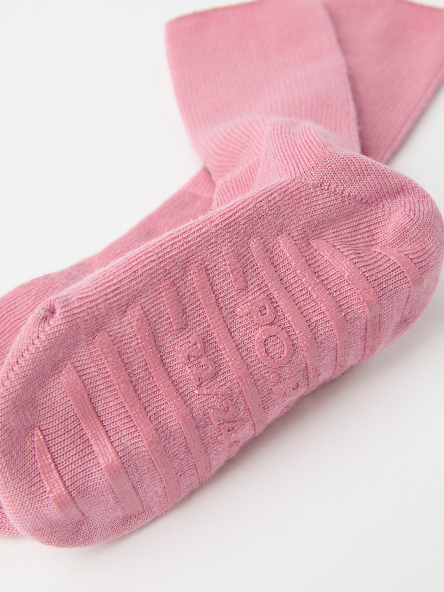 Pink Merino Antislip Kids Socks from Polarn O. Pyret kidswear. Nordic kids clothes made from sustainable sources.