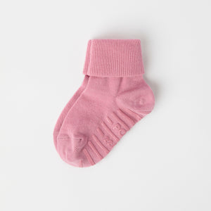 Pink Merino Antislip Kids Socks from Polarn O. Pyret kidswear. Nordic kids clothes made from sustainable sources.