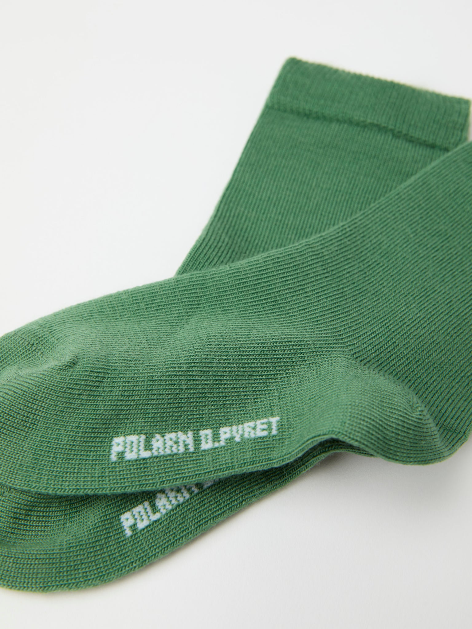 Green Merino Kids Socks from Polarn O. Pyret kidswear. Ethically produced kids clothing.