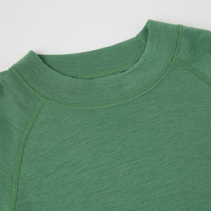 Green Thermal Merino Kids Top from the Polarn O. Pyret kidswear collection. Ethically produced kids outerwear.