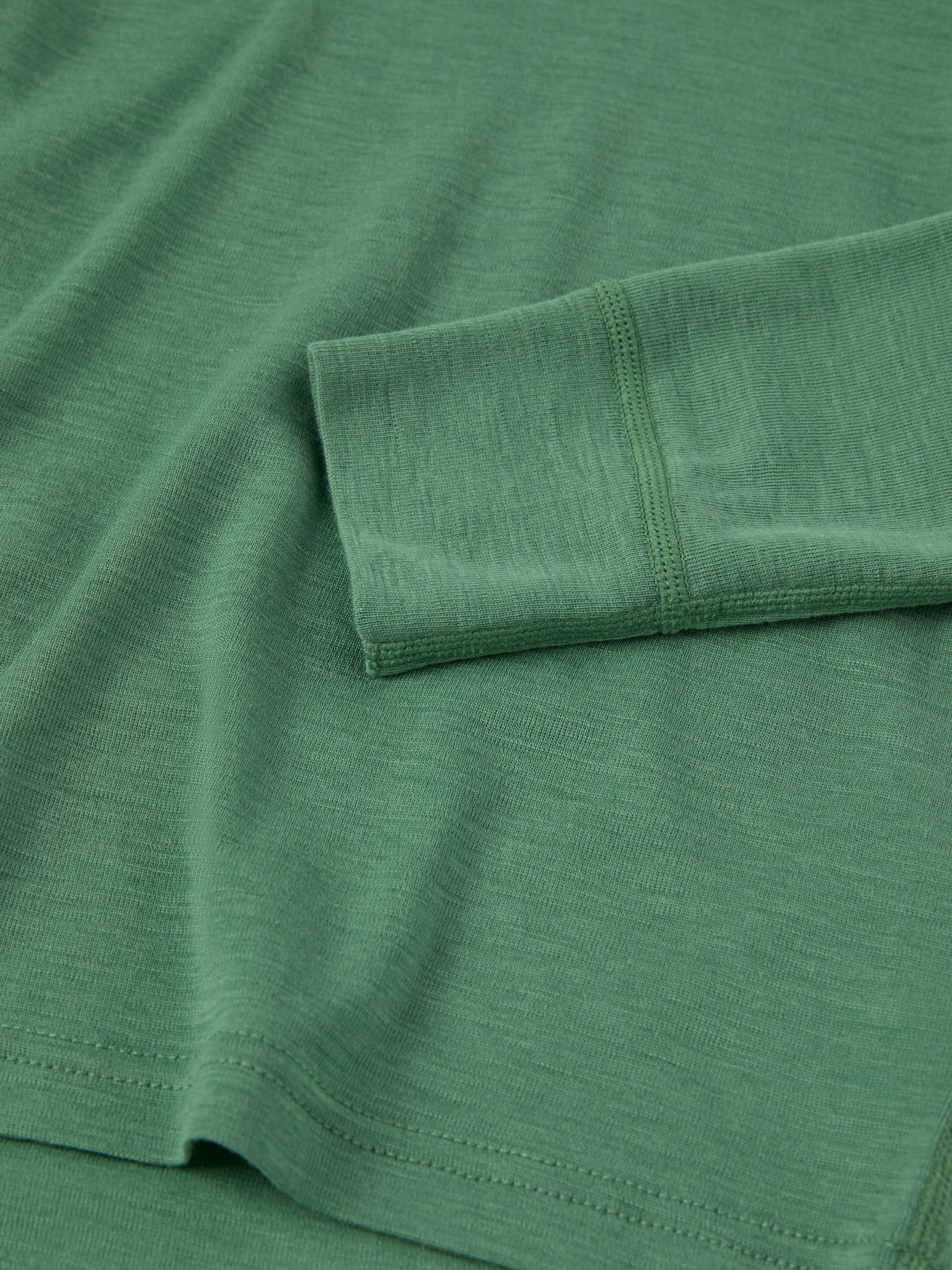 Green Thermal Merino Kids Top from the Polarn O. Pyret kidswear collection. Ethically produced kids outerwear.