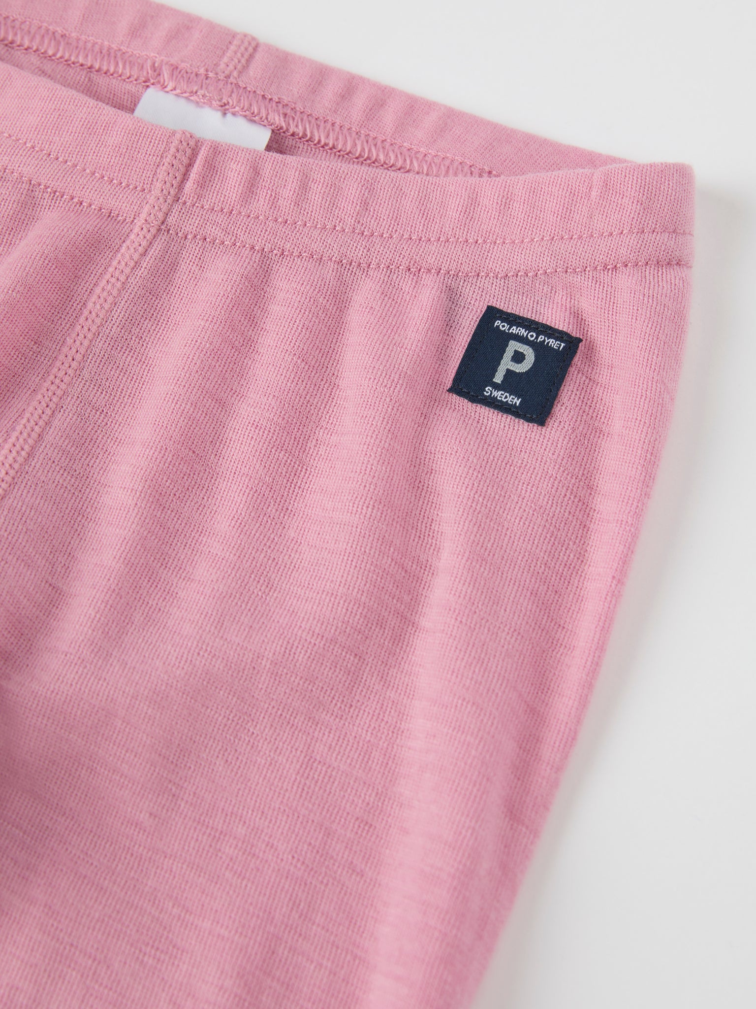 Pink Thermal Merino Kids Leggings from the Polarn O. Pyret kidswear collection. Ethically produced kids outerwear.