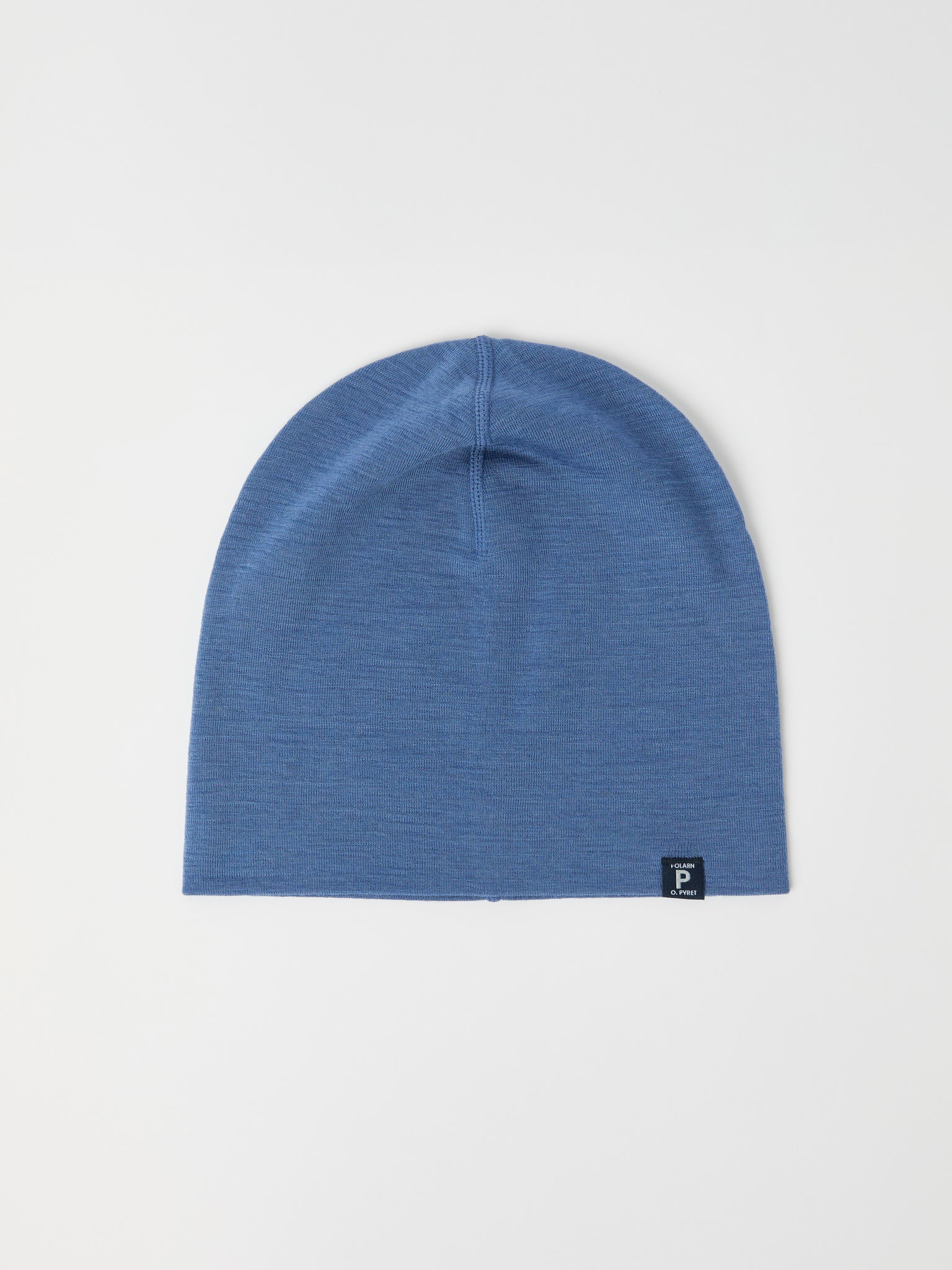 Blue Merino Wool Kids Beanie Hat from the Polarn O. Pyret kidswear collection. Made using ethically sourced materials.