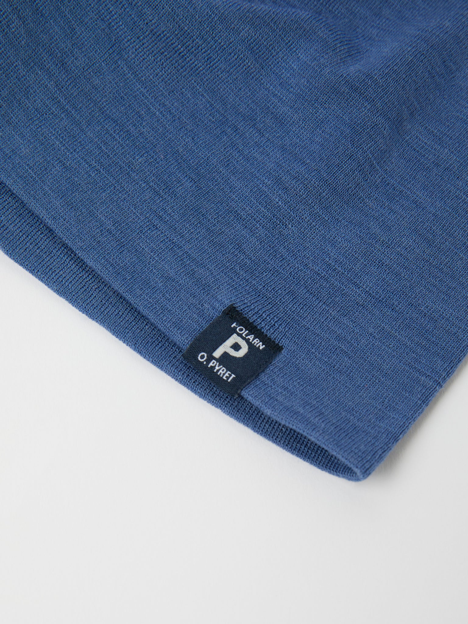 Blue Merino Wool Kids Beanie Hat from the Polarn O. Pyret kidswear collection. Made using ethically sourced materials.