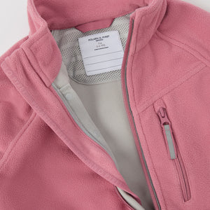 Pink Waterproof Kids Fleece Jacket from the Polarn O. Pyret kidswear collection. Made using ethically sourced materials.