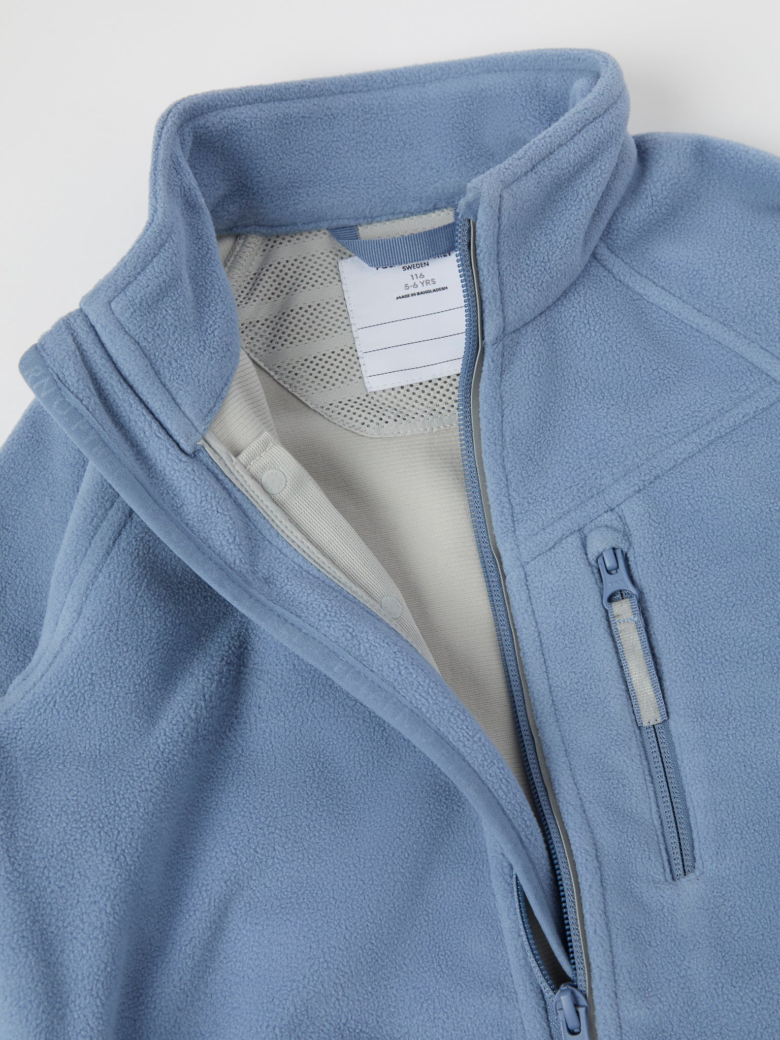 Blue Waterproof Kids Fleece Jacket from the Polarn O. Pyret kidswear collection. Ethically produced kids outerwear.