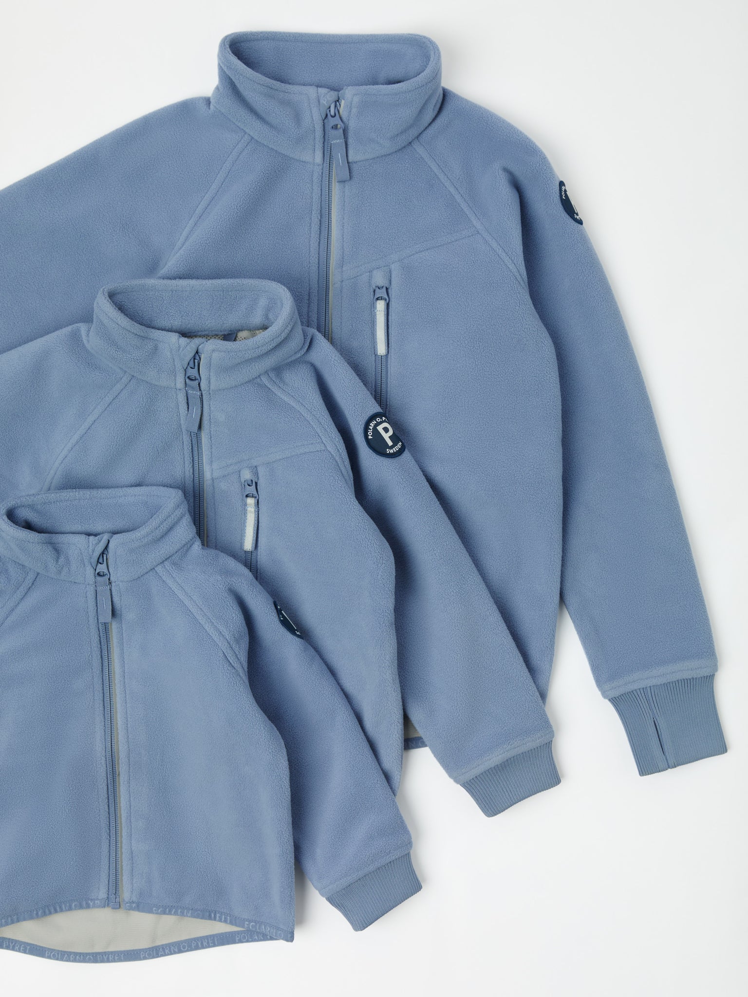 Blue Waterproof Kids Fleece Jacket from the Polarn O. Pyret kidswear collection. Ethically produced kids outerwear.