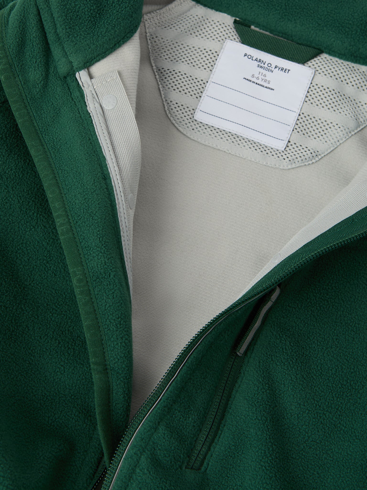 Green Waterproof Kids Fleece Jacket from the Polarn O. Pyret kidswear collection. The best ethical kids outerwear.