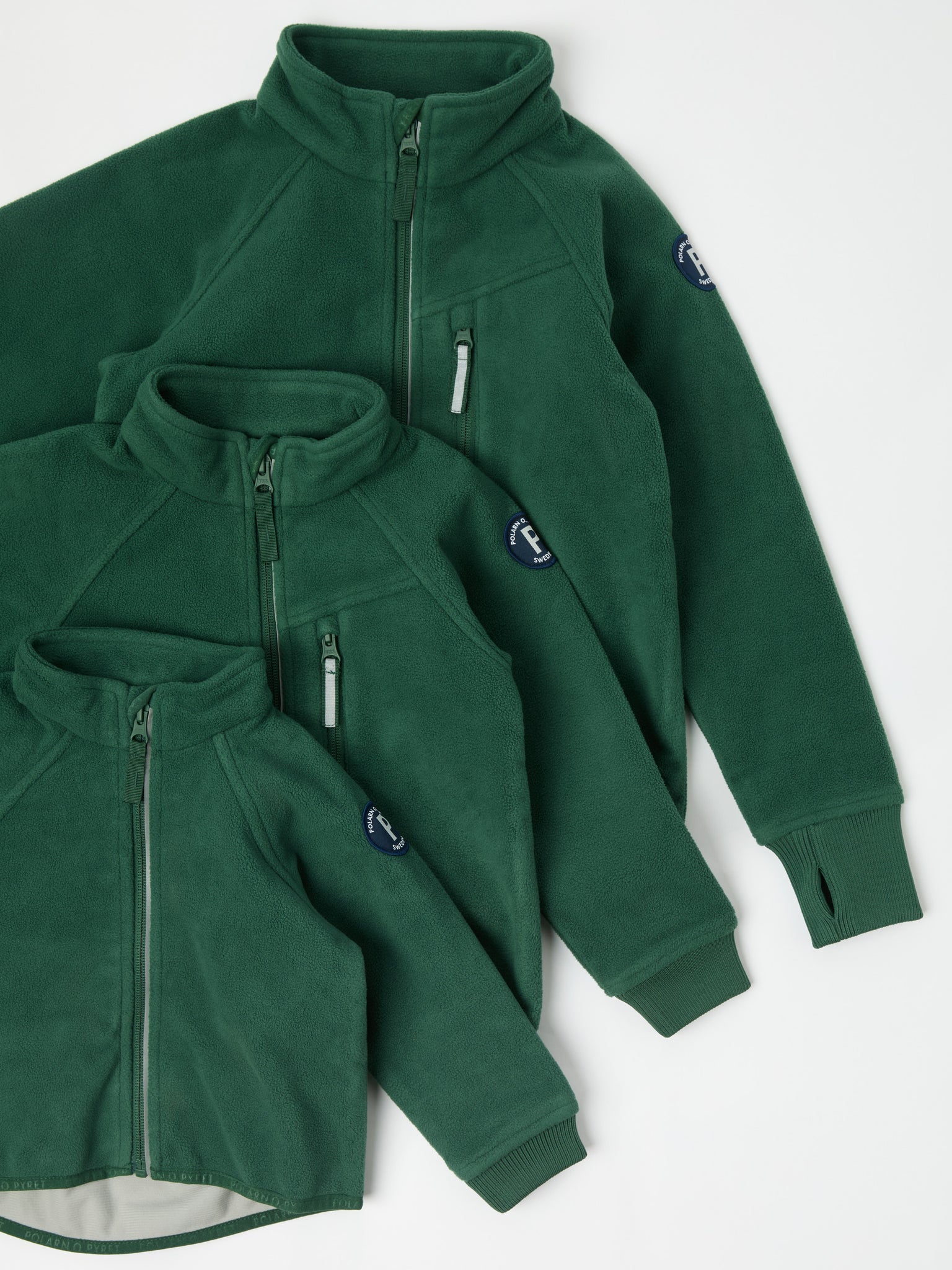 Green Waterproof Kids Fleece Jacket from the Polarn O. Pyret kidswear collection. The best ethical kids outerwear.