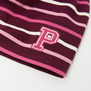 Burgundy Striped Kids Beanie Hat from the Polarn O. Pyret kidswear collection. Made using ethically sourced materials.