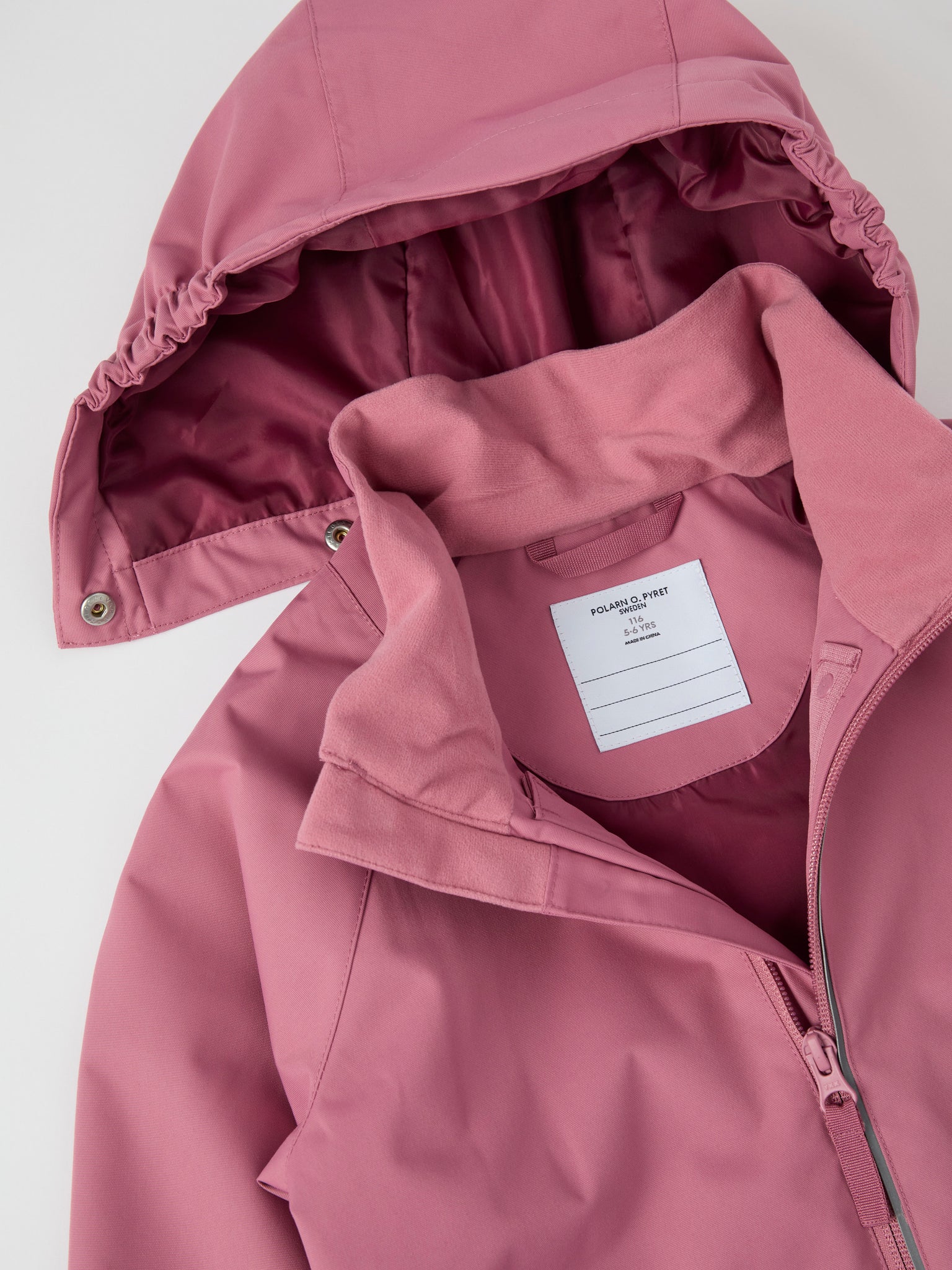 Lightweight Waterproof Kids Shell Jacket from the Polarn O. Pyret kidswear collection. Made using ethically sourced materials.