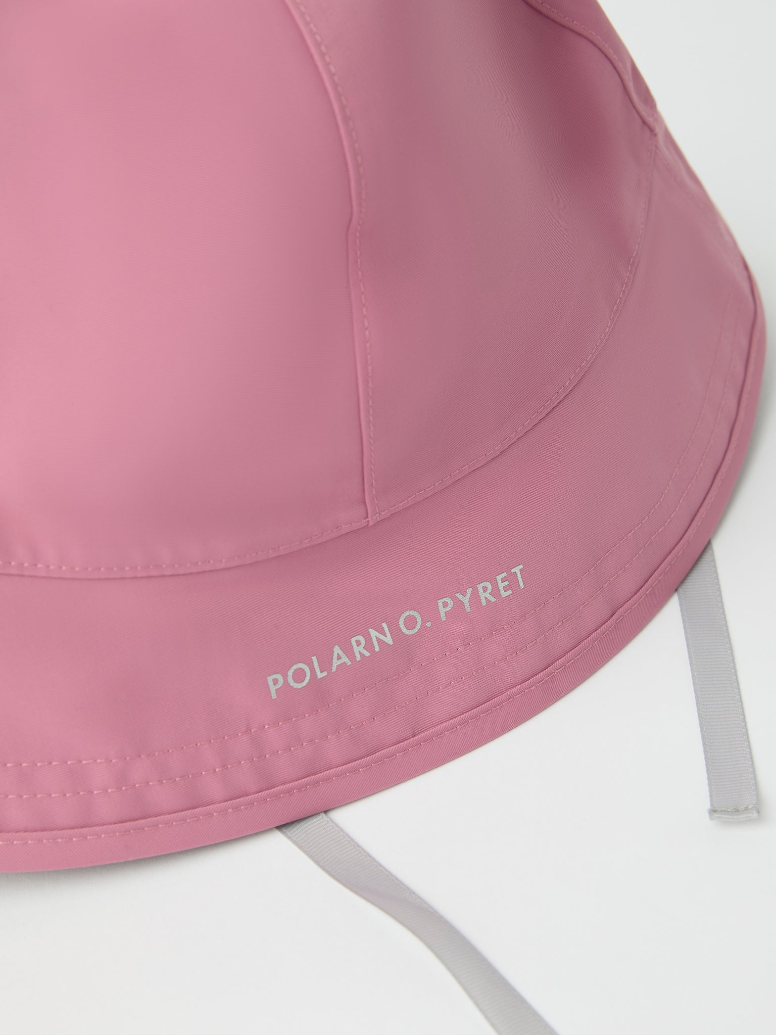 Pink Kids Waterproof Rain Hat from the Polarn O. Pyret kidswear collection. The best ethical kids outerwear.