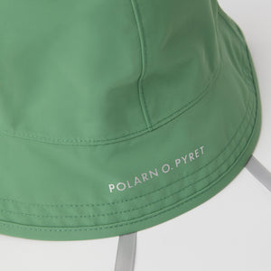 Green Kids Waterproof Rain Hat from the Polarn O. Pyret kidswear collection. Quality kids clothing made to last.