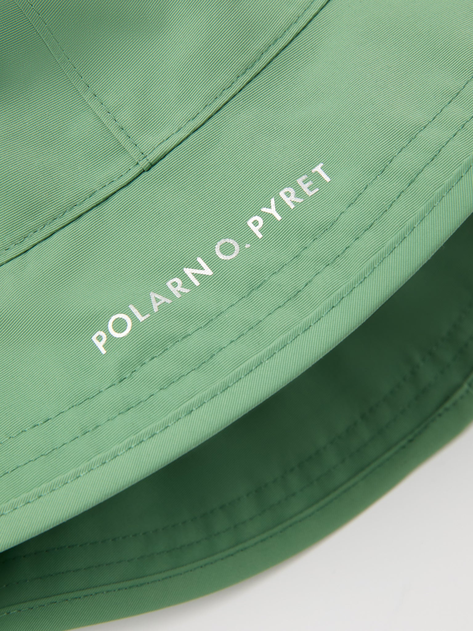 Green Kids Waterproof Rain Hat from the Polarn O. Pyret kidswear collection. Quality kids clothing made to last.