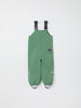 Green Waterproof Kids Shell Dungarees from the Polarn O. Pyret kidswear collection. The best ethical kids outerwear.