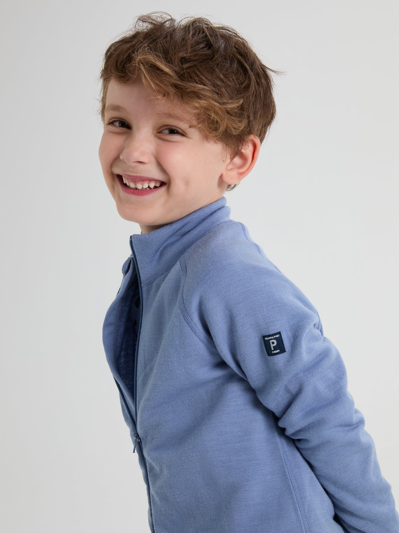 Blue Thermal Terry Merino Kids Zip Top from the Polarn O. Pyret kidswear collection. Quality kids clothing made to last.