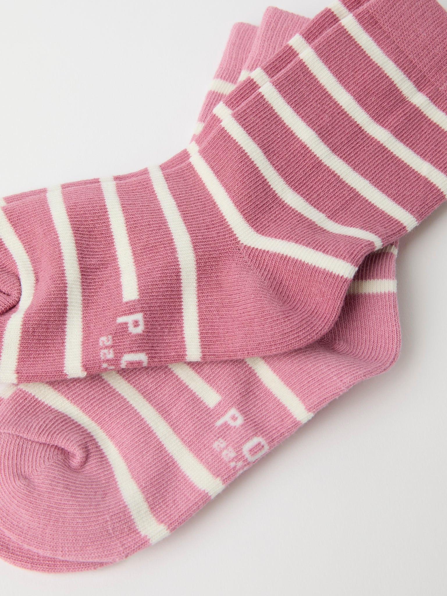 Two Pack Pink Striped Kids Socks from Polarn O. Pyret kidswear. Clothes made using sustainably sourced materials.