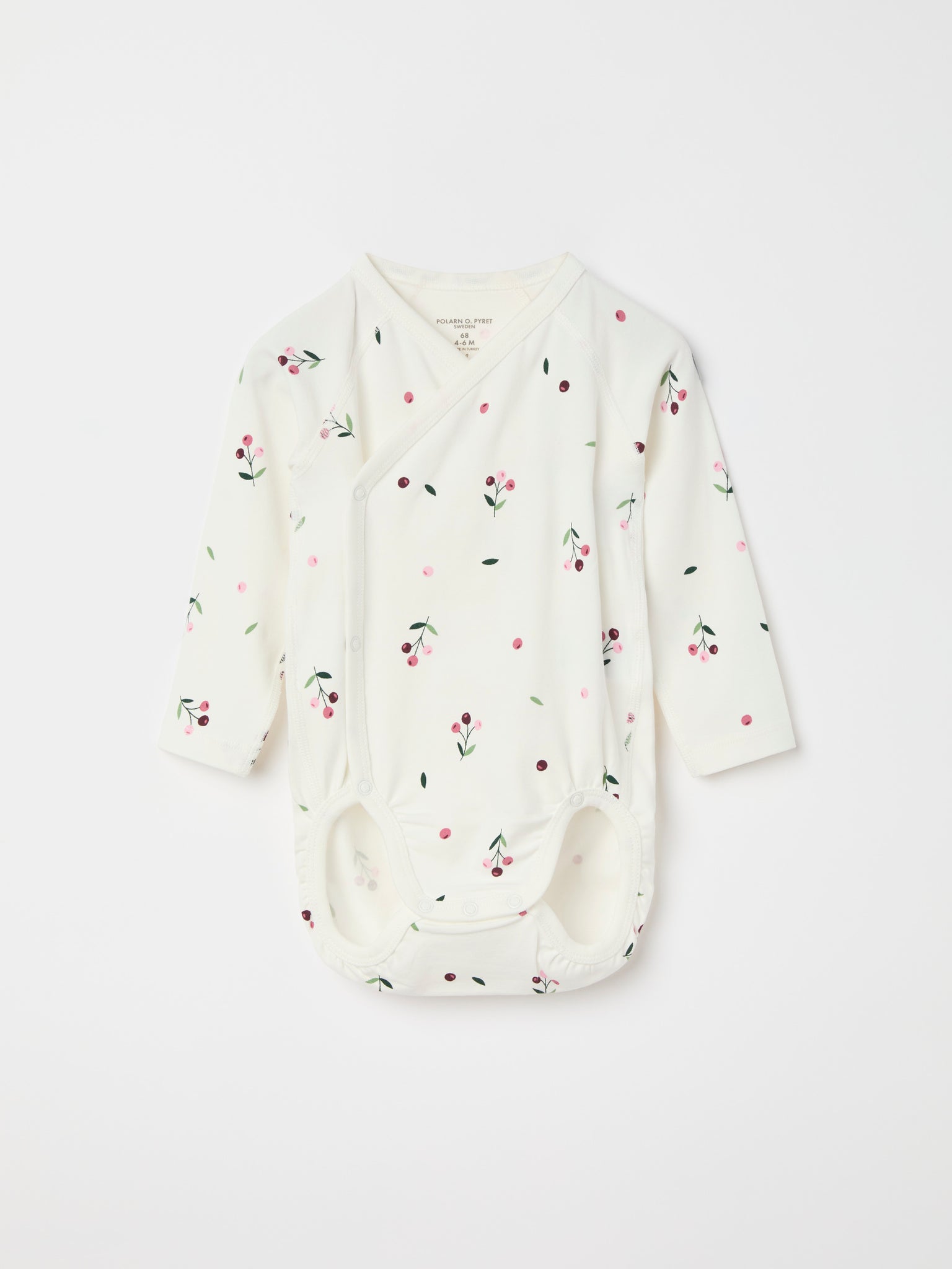 Floral Print Wraparound Babygrow from the Polarn O. Pyret baby collection. Clothes made using sustainably sourced materials.