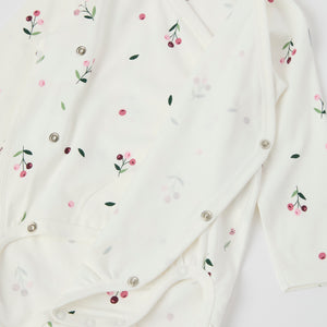 Floral Print Wraparound Babygrow from the Polarn O. Pyret baby collection. Clothes made using sustainably sourced materials.