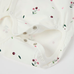 Floral Print Wraparound Babygrow from the Polarn O. Pyret baby collection. Clothes made using sustainably sourced materials.