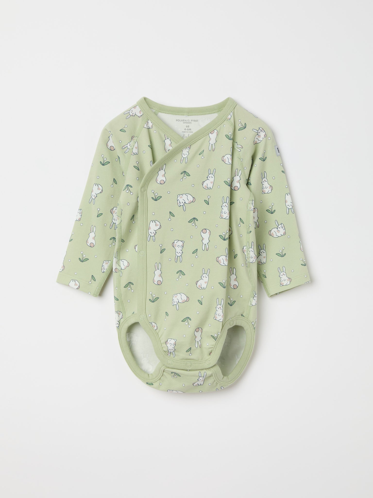 Bunny Print Wraparound Babygrow from the Polarn O. Pyret baby collection. Ethically produced kids clothing.