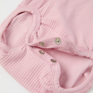 Pink Frilled Organic Cotton Babygrow from the Polarn O. Pyret baby collection. Ethically produced kids clothing.