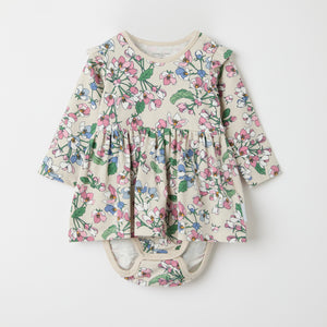 Apple Blossom Print Babygrow from the Polarn O. Pyret baby collection. Clothes made using sustainably sourced materials.