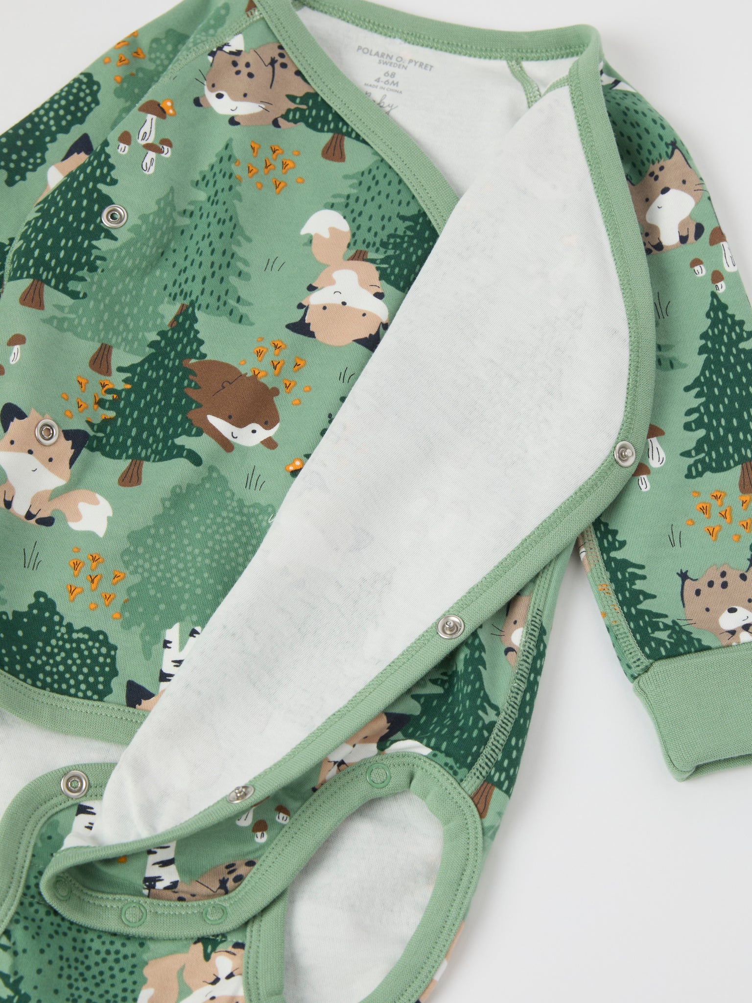 Forest Print Wraparound Babygrow from the Polarn O. Pyret baby collection. The best ethical kids clothes