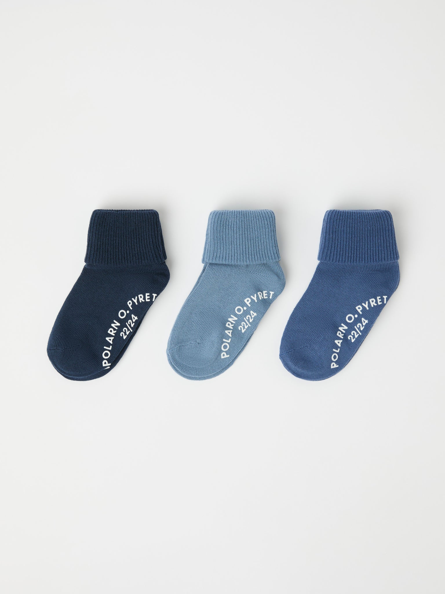 Three Pack Blue Antislip Kids Socks from Polarn O. Pyret kidswear. Nordic kids clothes made from sustainable sources.