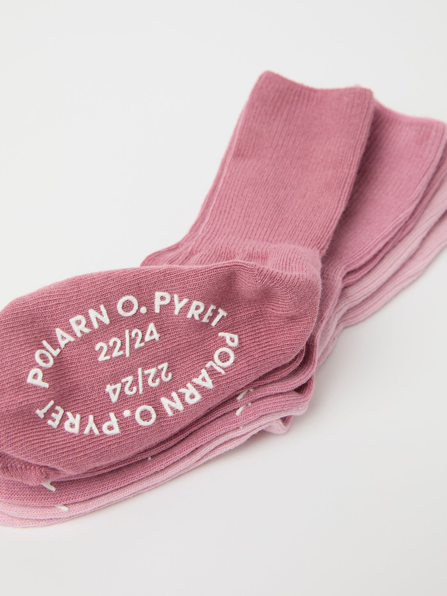 Three Pack Pink Antislip Kids Socks from Polarn O. Pyret kidswear. Clothes made using sustainably sourced materials.