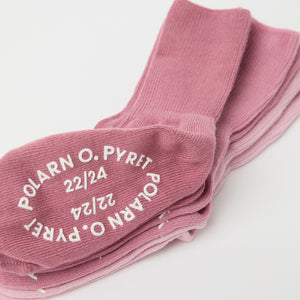 Three Pack Pink Antislip Kids Socks from Polarn O. Pyret kidswear. Clothes made using sustainably sourced materials.