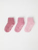 Three Pack Pink Antislip Kids Socks from Polarn O. Pyret kidswear. Clothes made using sustainably sourced materials.