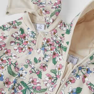 Apple blossom Print Baby All-in-one from the Polarn O. Pyret baby collection. Clothes made using sustainably sourced materials.