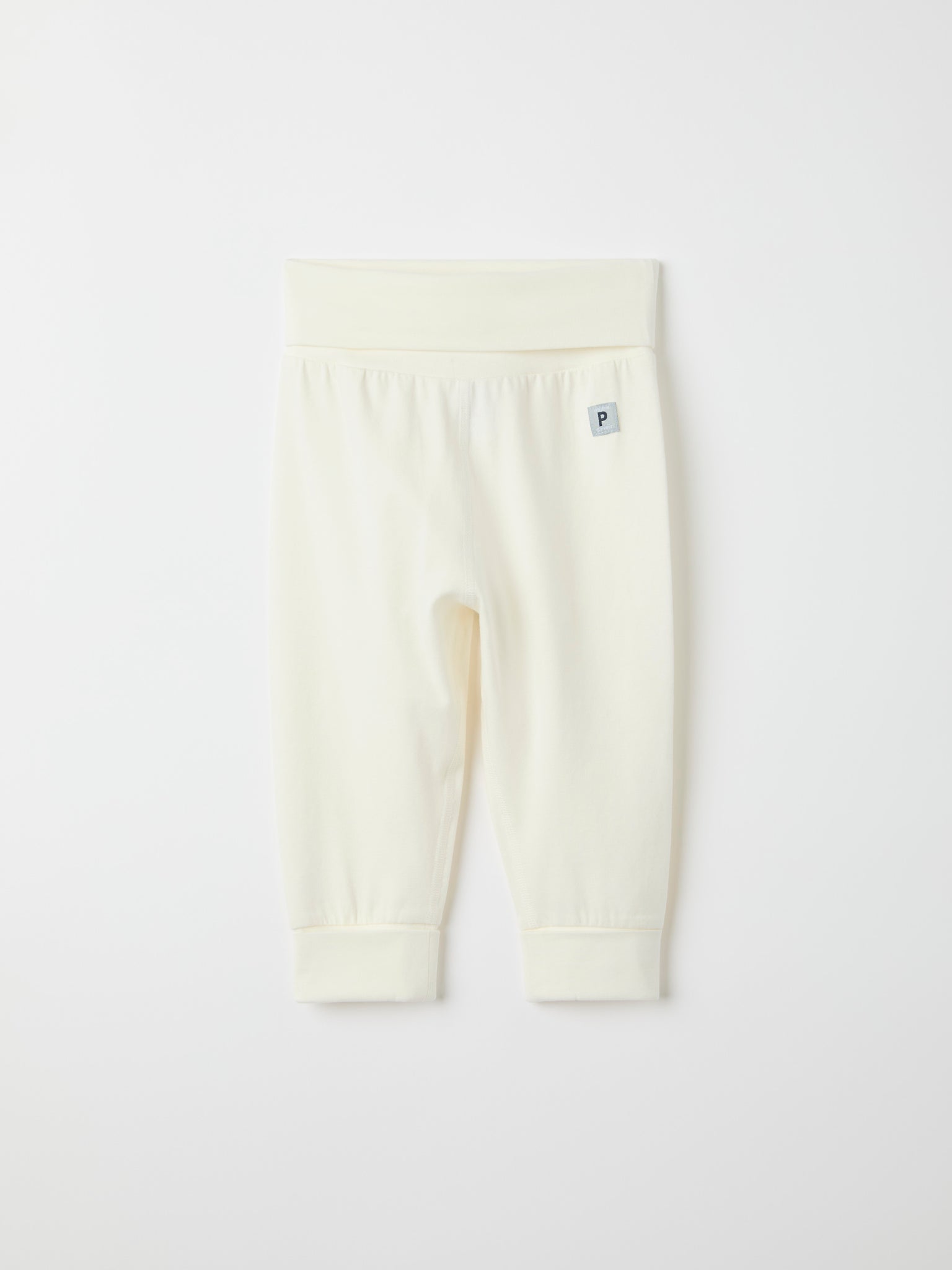 White Cotton Baby Leggings from the Polarn O. Pyret baby collection. Ethically produced kids clothing.