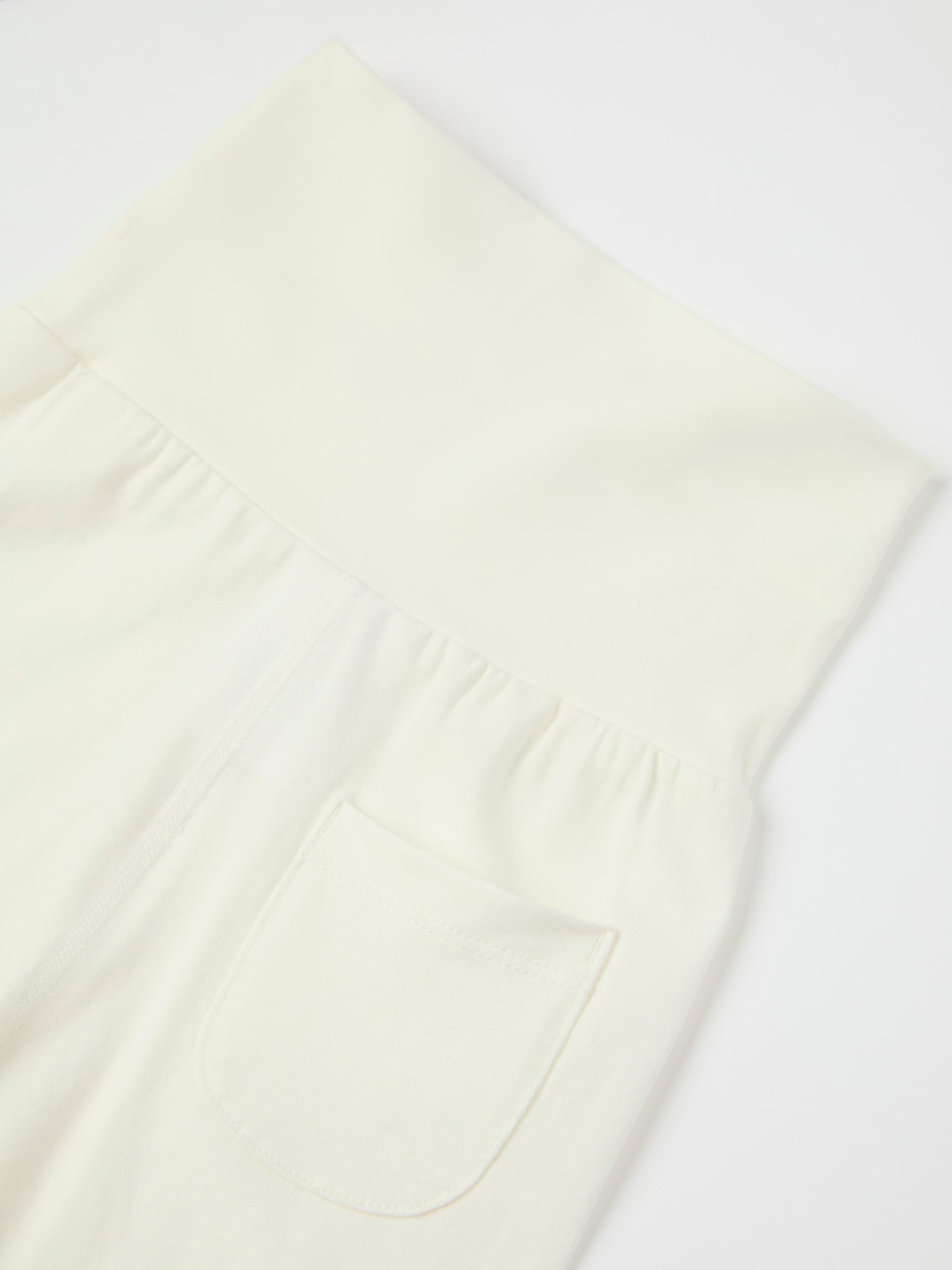 White Cotton Baby Leggings from the Polarn O. Pyret baby collection. Ethically produced kids clothing.