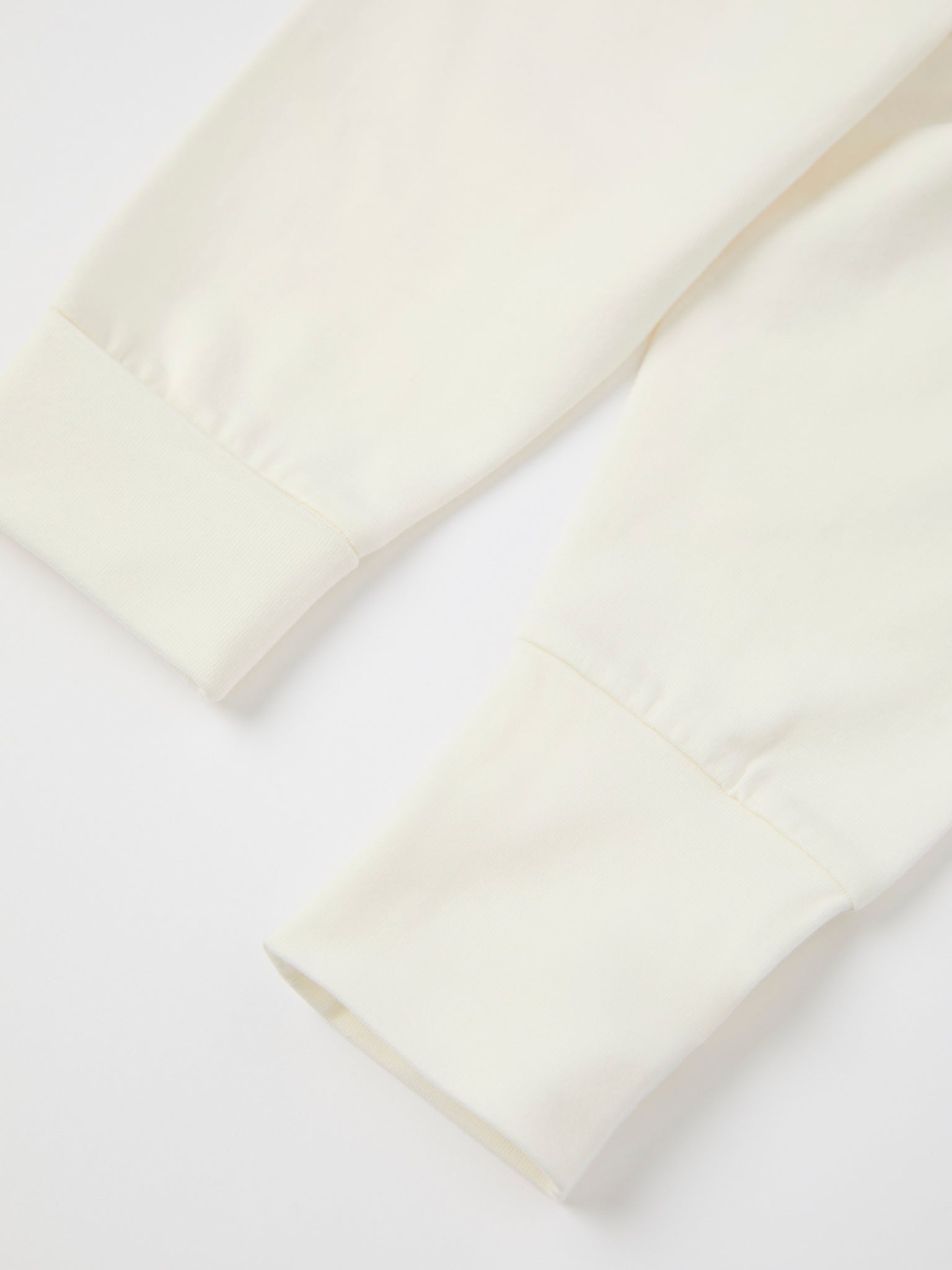 White Cotton Baby Leggings from the Polarn O. Pyret baby collection. Ethically produced kids clothing.