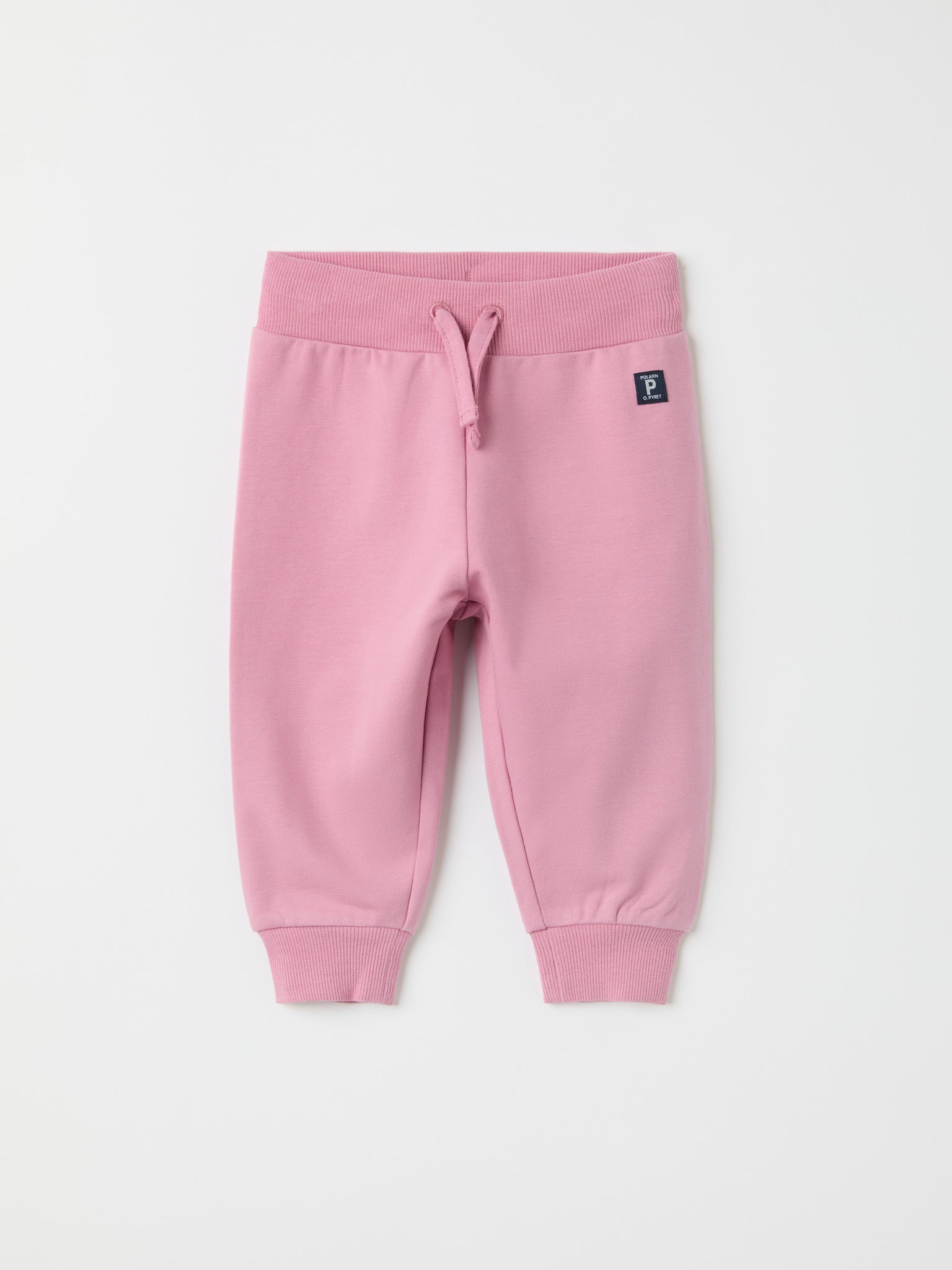 Pink Organic Cotton Baby Joggers from the Polarn O. Pyret baby collection. Nordic kids clothes made from sustainable sources.