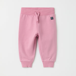 Pink Organic Cotton Baby Joggers from the Polarn O. Pyret baby collection. Nordic kids clothes made from sustainable sources.