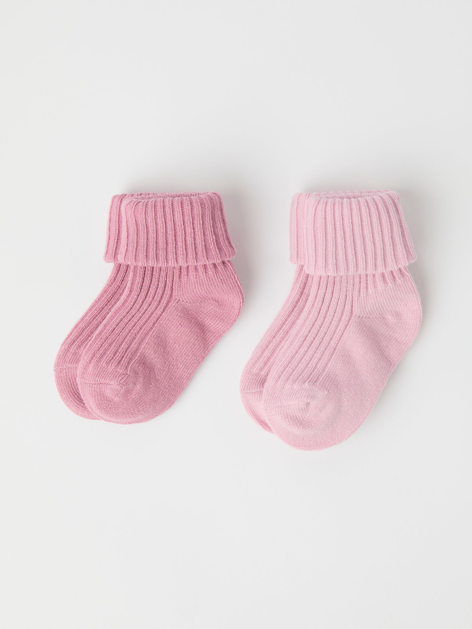 Two Pack Pink Baby Socks from the Polarn O. Pyret baby collection. Clothes made using sustainably sourced materials.